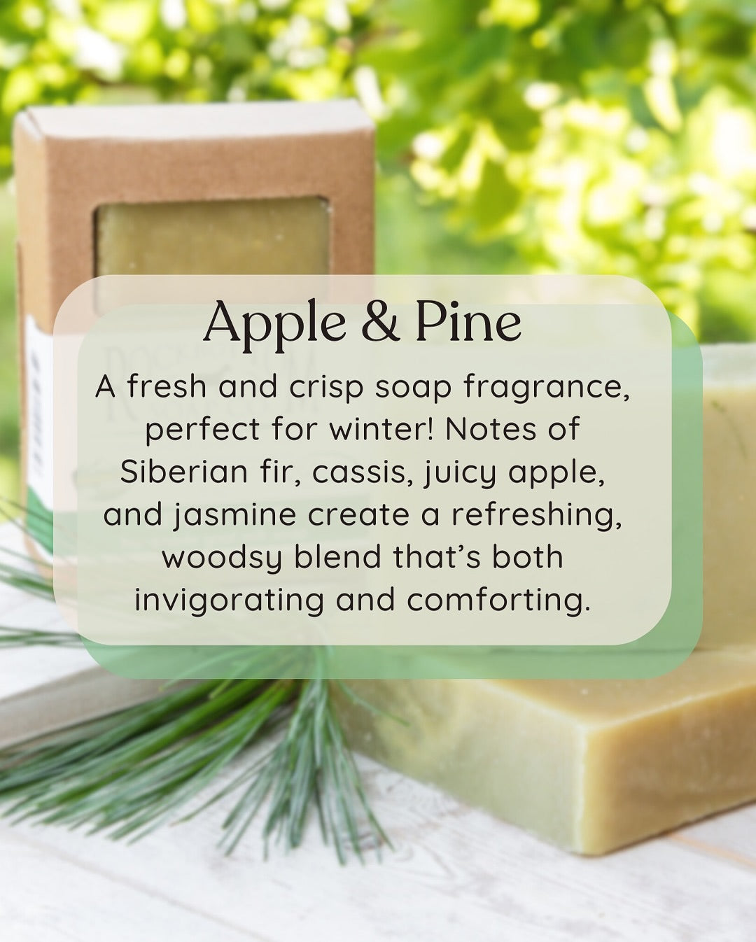 relaxing out door picture of apple and pine goat milk soap with pine needles with scent description over lay