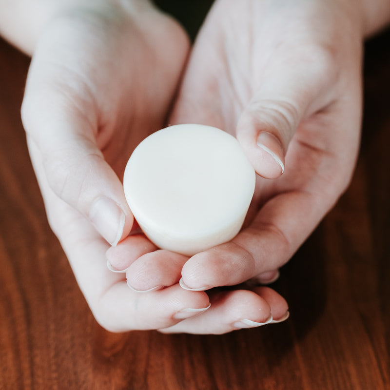 lotion bars in hand