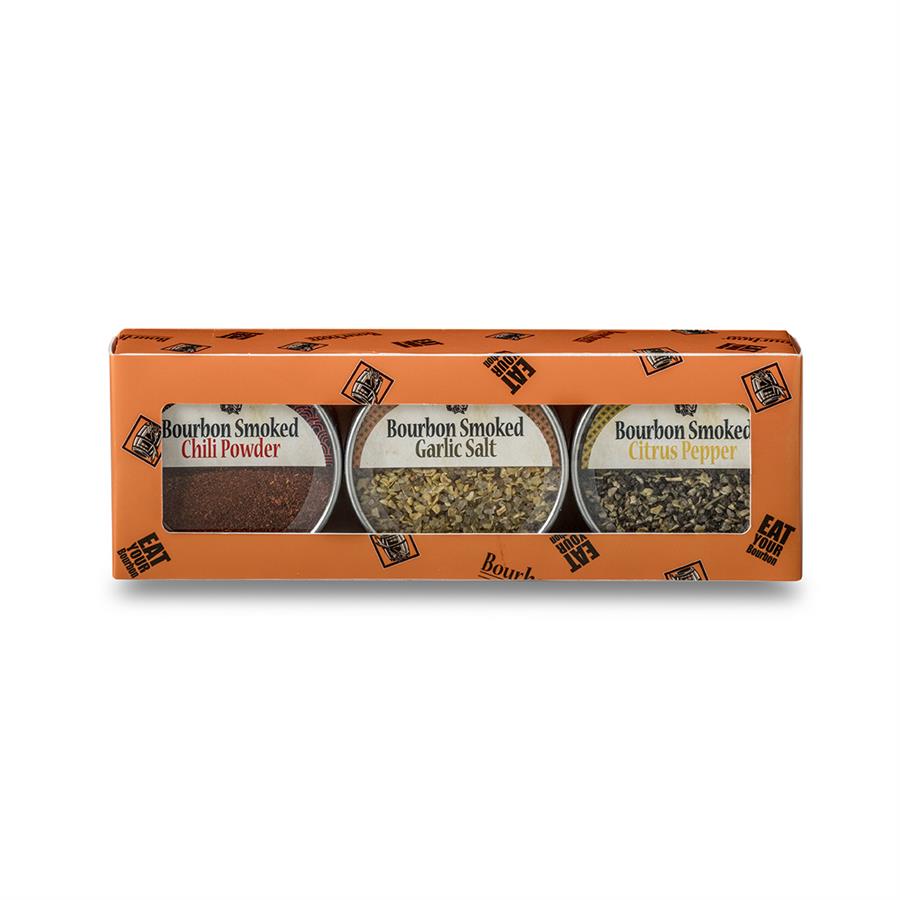 A rectangular package containing three spice containers labeled Bourbon Smoked Sea Salt, Bourbon Smoked Pepper, and Bourbon Smoked Paprika.