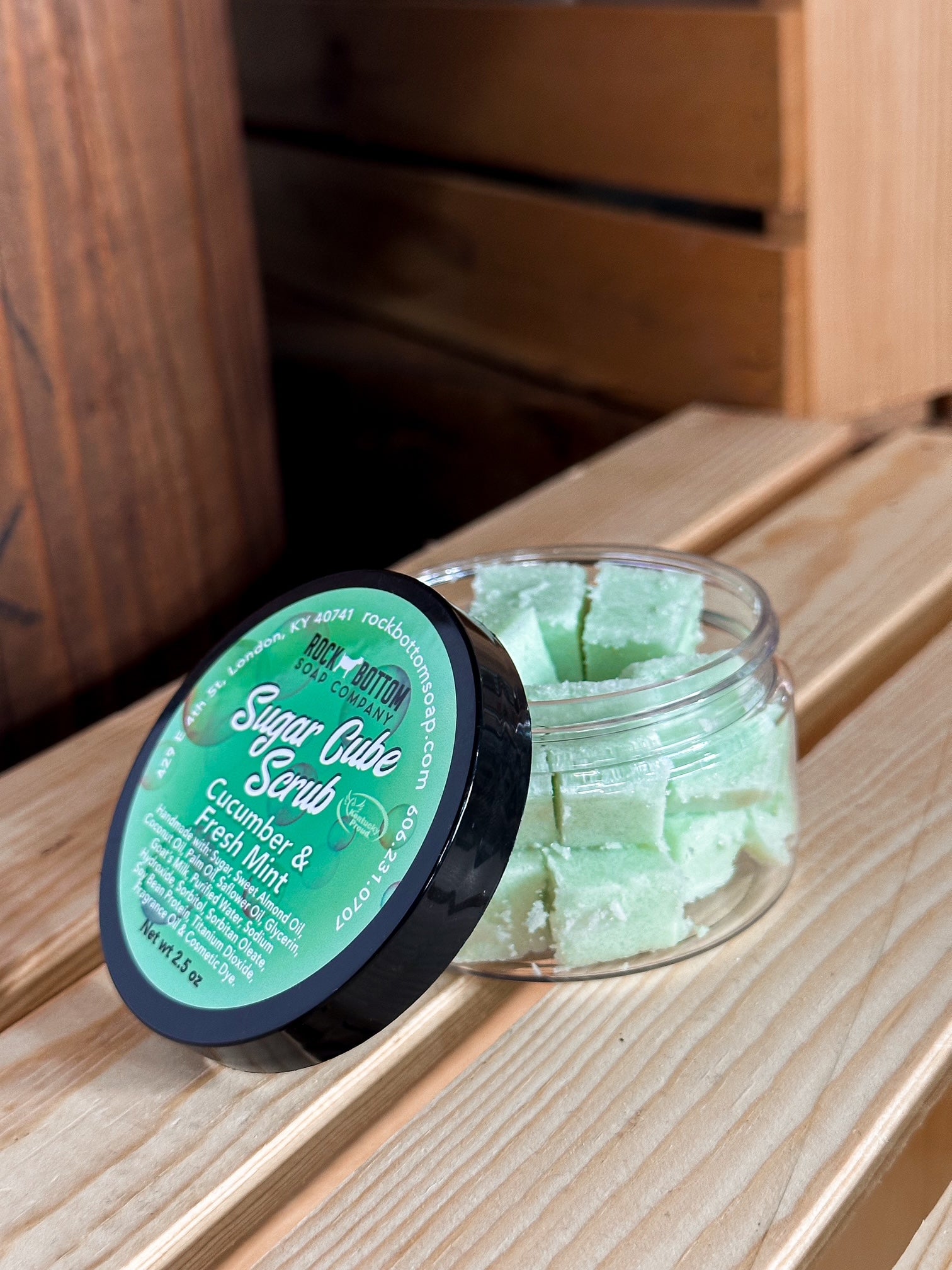 Travel-sized jar of goat milk sugar cube scrubs – handmade exfoliating cubes for cleansing and moisturizing skin, perfect for on-the-go skincare. Cucumber and Fresh Mint