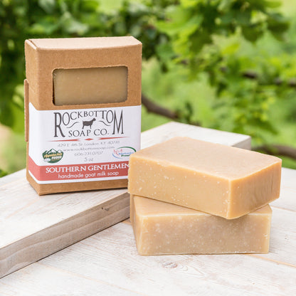 Southern Gentleman Goat Milk Soap on a wooden tray in an outdoor setting – rich, masculine handmade artisan soap with a classic scent